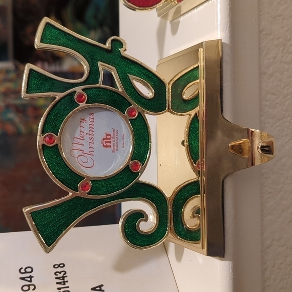 Bnib Joy stocking holder in red and green with weighted gold base and hook. - Picture 2 of 6
